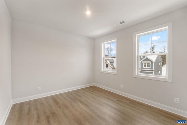 empty room featuring light hardwood / wood-style floors