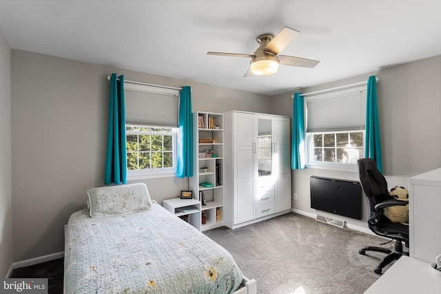 bedroom with ceiling fan and carpet