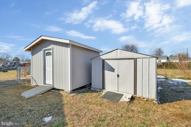 view of outbuilding featuring a lawn