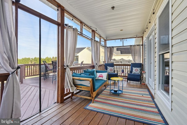 sunroom featuring a wealth of natural light