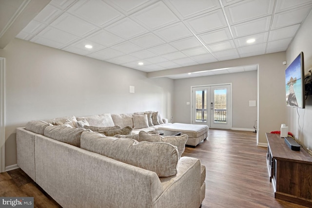 living room with french doors and dark hardwood / wood-style flooring