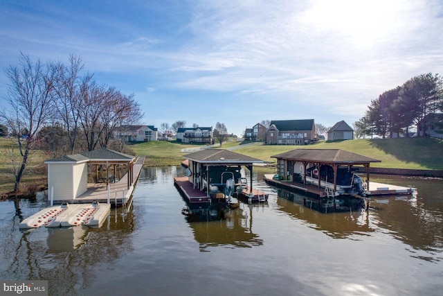 dock area with a water view