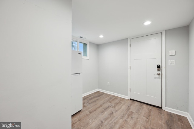 foyer featuring light hardwood / wood-style flooring