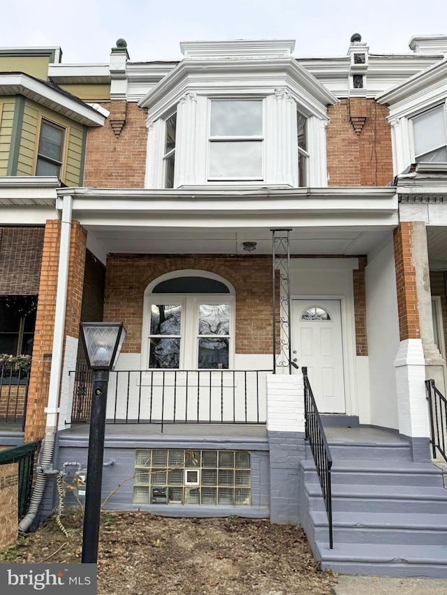 doorway to property featuring a porch