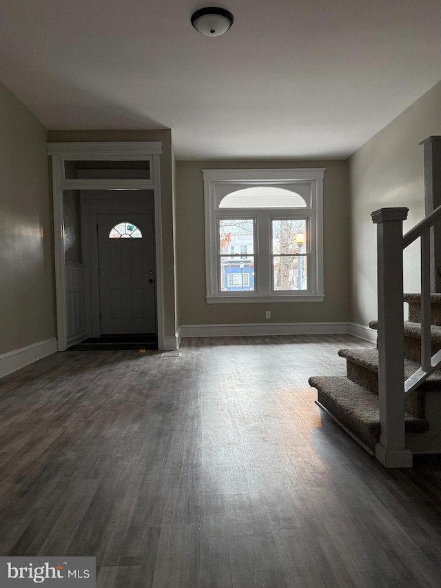 foyer featuring dark hardwood / wood-style floors