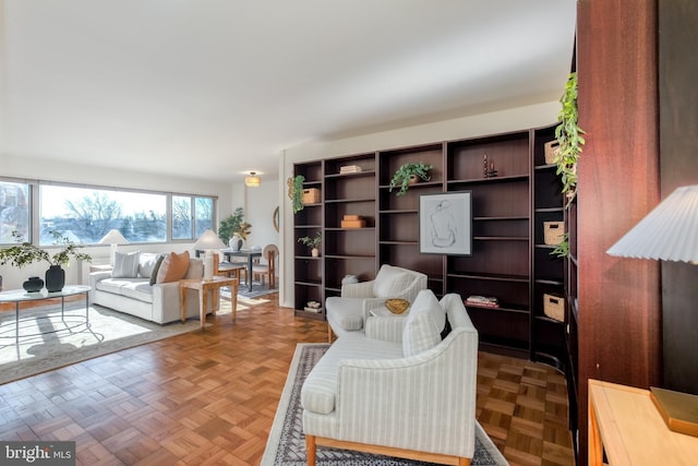 living room with parquet flooring