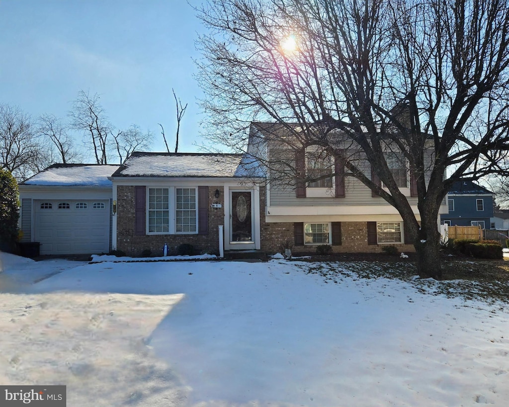 split level home featuring a garage