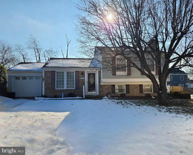 split level home featuring a garage