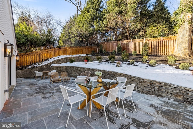 view of snow covered patio