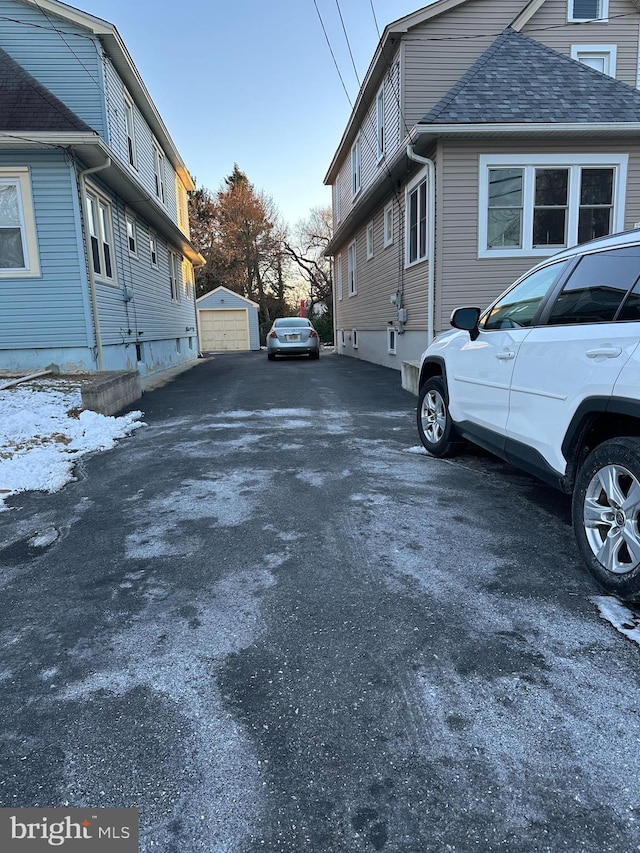 view of property exterior with a garage