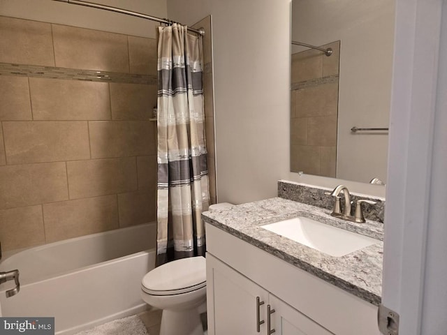 full bathroom featuring shower / bath combo, vanity, and toilet