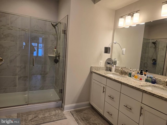 bathroom featuring vanity and walk in shower