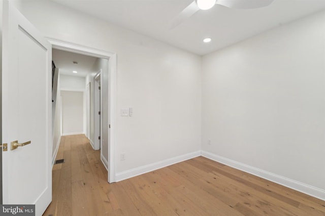 unfurnished room featuring ceiling fan and light hardwood / wood-style flooring