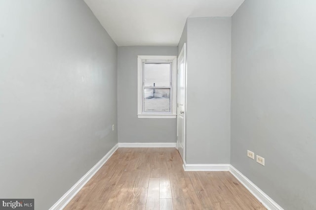 spare room with light hardwood / wood-style floors