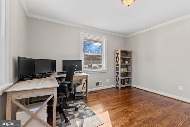 office space featuring dark wood-type flooring and crown molding