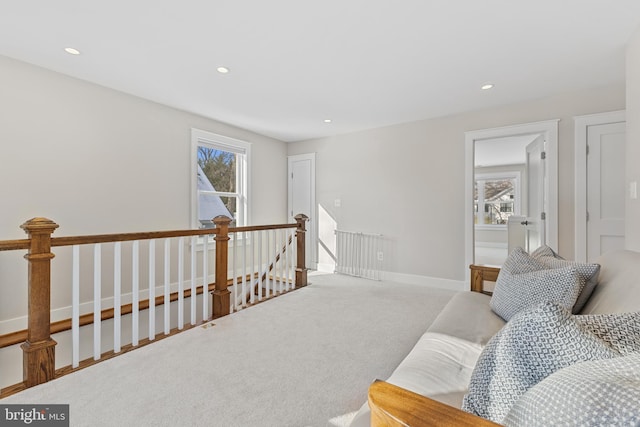 interior space with carpet flooring and a wealth of natural light