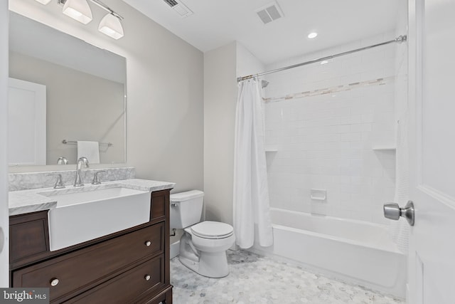 full bathroom with toilet, vanity, and shower / tub combo with curtain