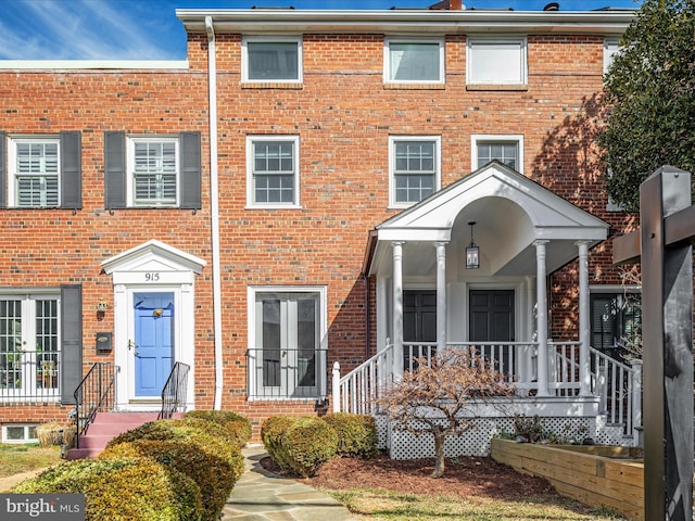 multi unit property with french doors and brick siding