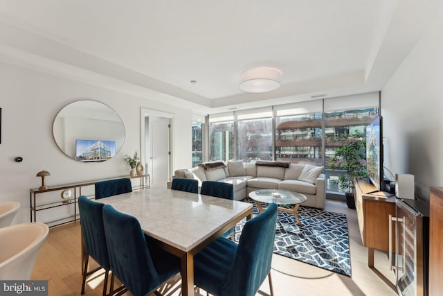 dining room with light wood-type flooring