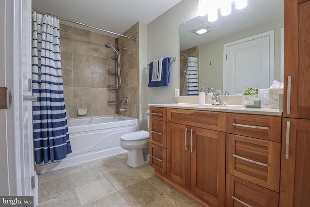 full bathroom featuring shower / bathtub combination with curtain, vanity, and toilet