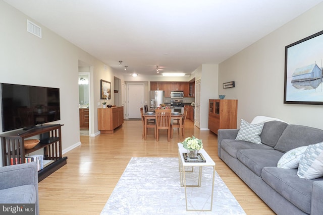 living room featuring light hardwood / wood-style floors