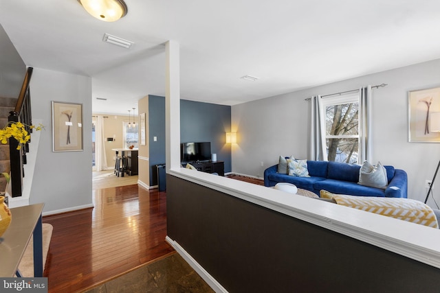 living room featuring dark hardwood / wood-style flooring