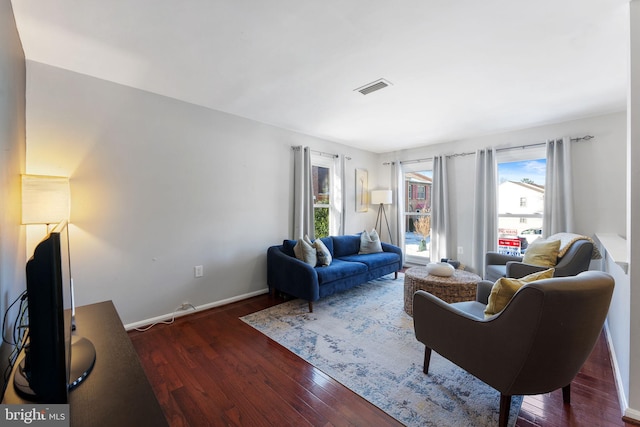 living room with dark wood-type flooring