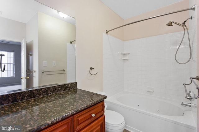 full bathroom with shower / bathing tub combination, vanity, and toilet