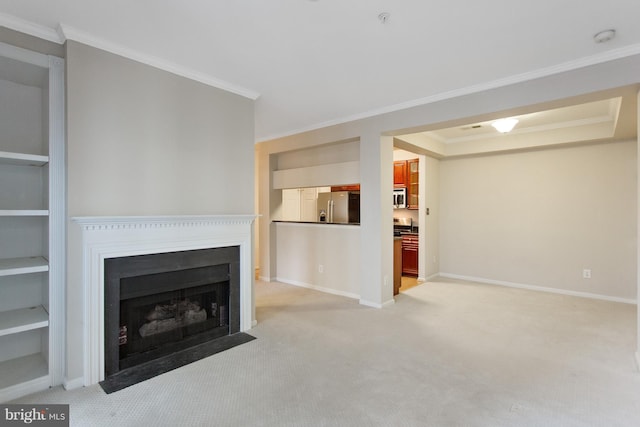 unfurnished living room featuring light colored carpet and ornamental molding