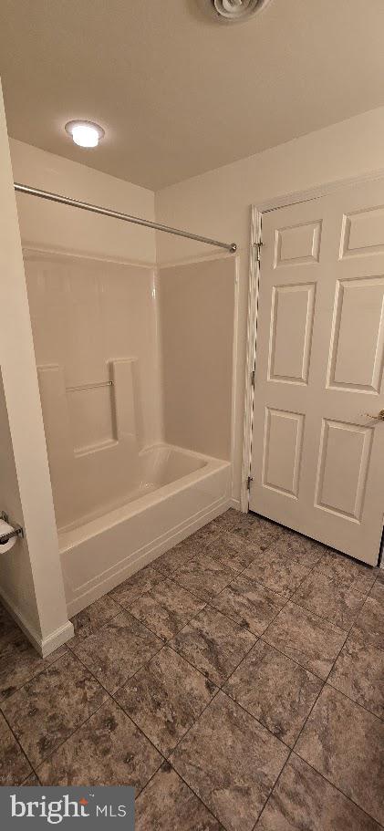 bathroom featuring shower / bathtub combination