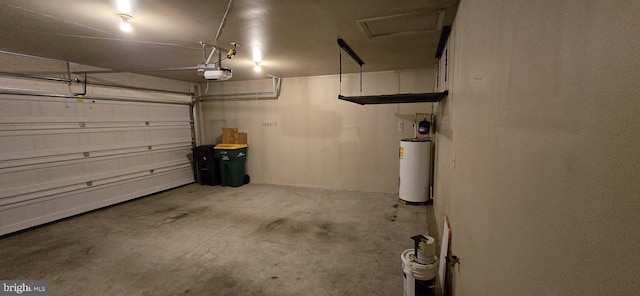 garage with gas water heater and a garage door opener