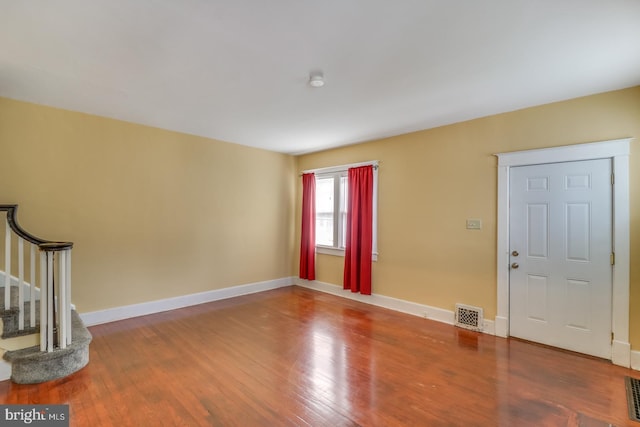 entryway with wood-type flooring