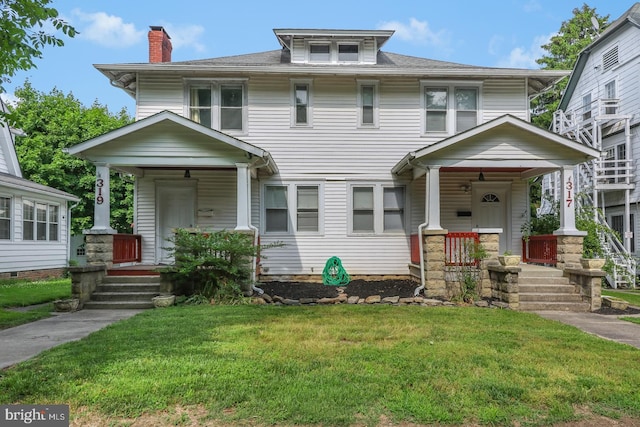 view of front of property featuring a front lawn and covered porch