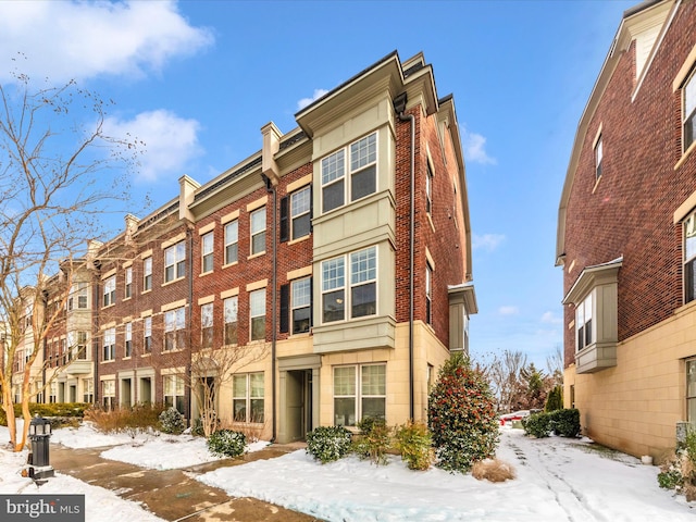 view of snow covered property