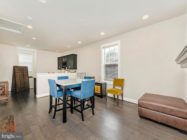 dining space with dark wood-type flooring