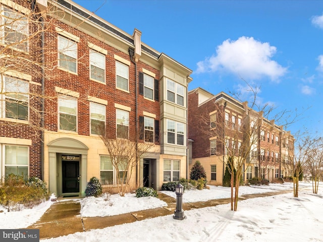 view of snow covered building