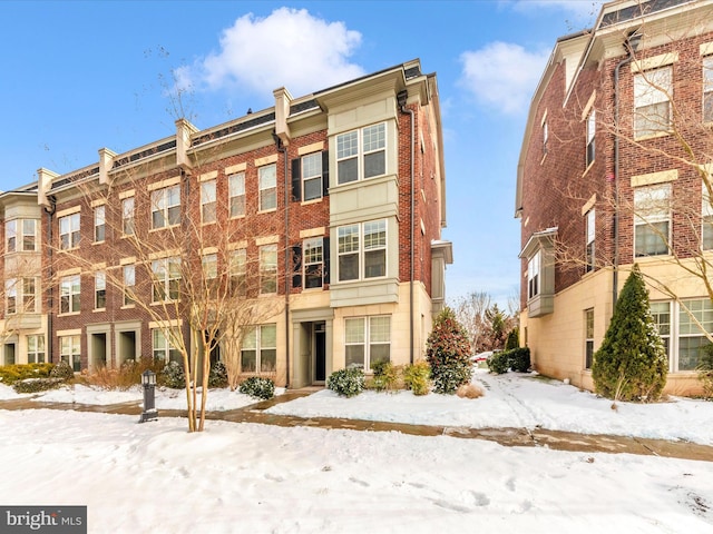 view of snow covered building