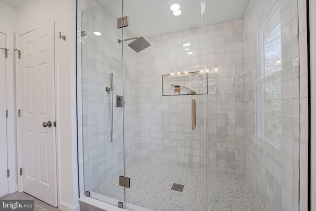 bathroom featuring a stall shower