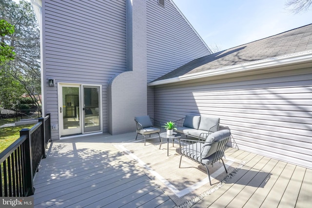 deck featuring outdoor lounge area