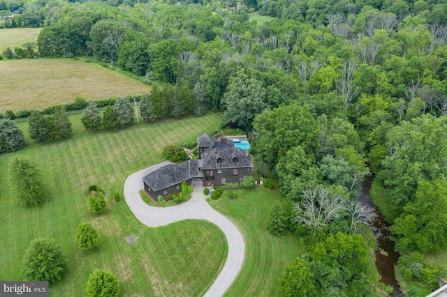 birds eye view of property featuring a rural view