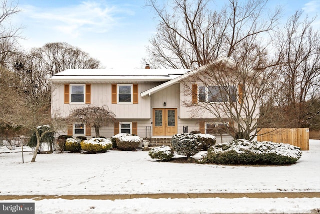 bi-level home featuring french doors