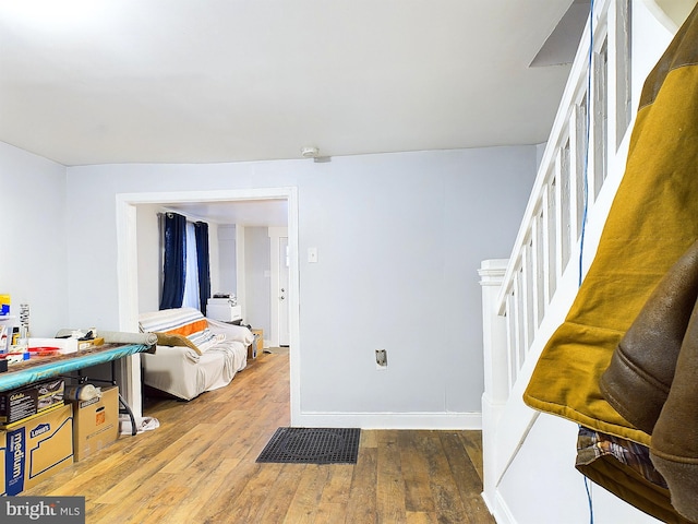 bedroom featuring wood-type flooring