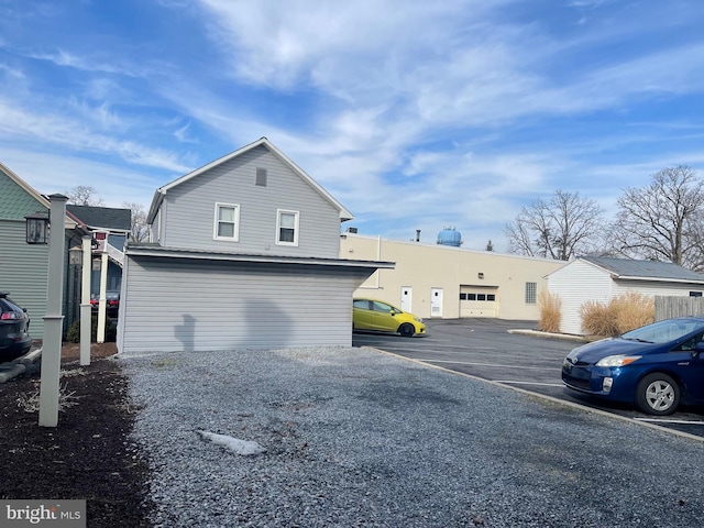 exterior space featuring uncovered parking