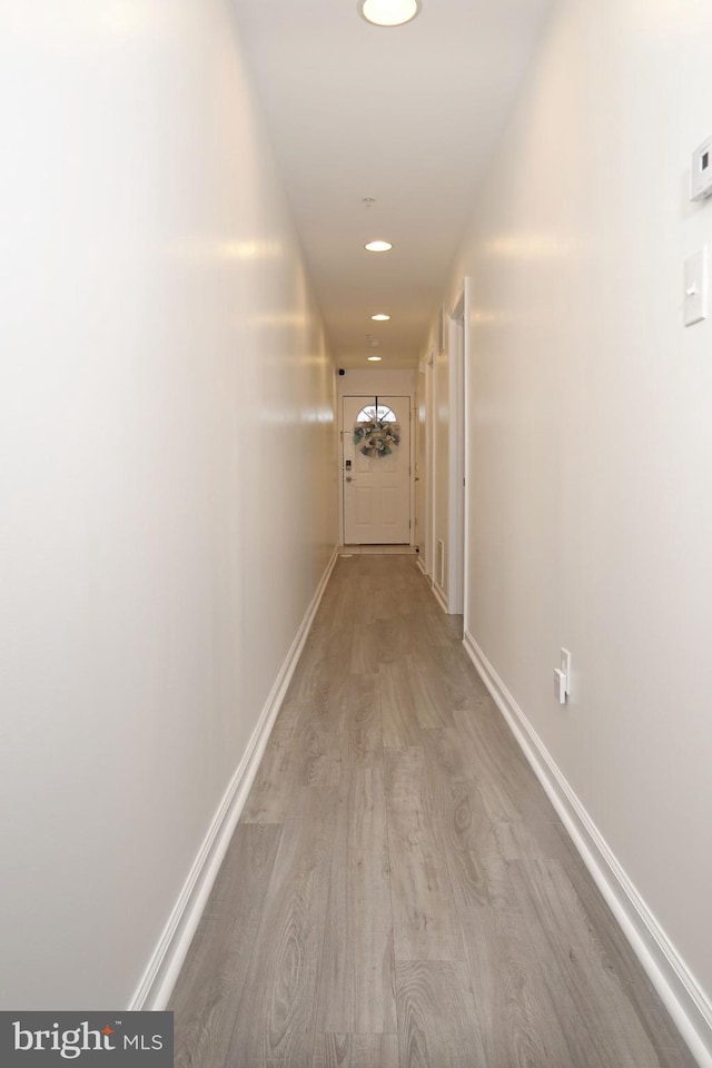 hall featuring light hardwood / wood-style floors