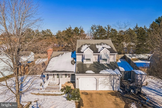 front of property with a garage