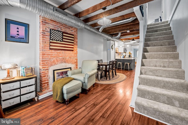 interior space featuring hardwood / wood-style flooring and a fireplace