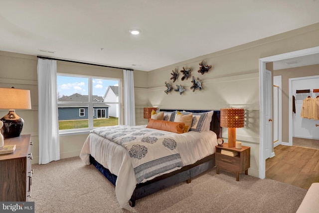 bedroom featuring light hardwood / wood-style floors