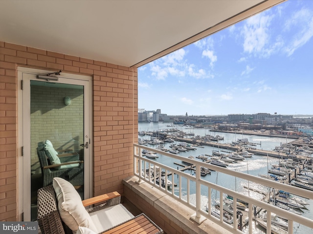 balcony featuring a water view