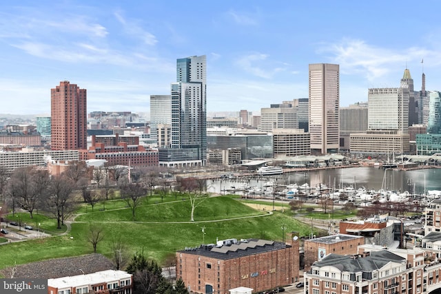 property's view of city featuring a water view