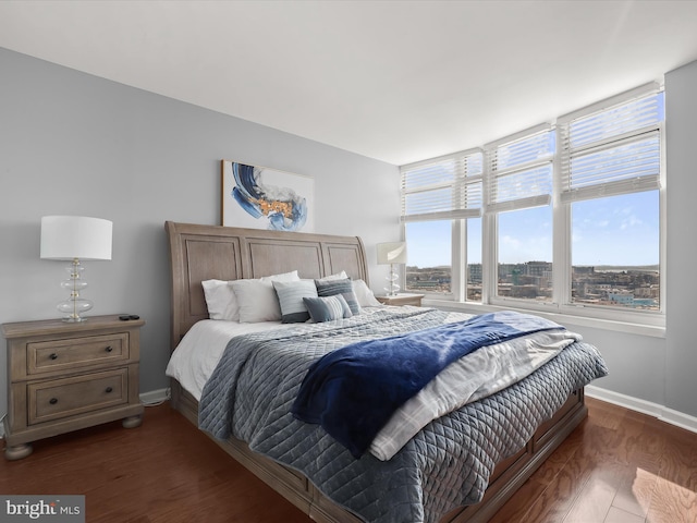 bedroom featuring dark hardwood / wood-style floors